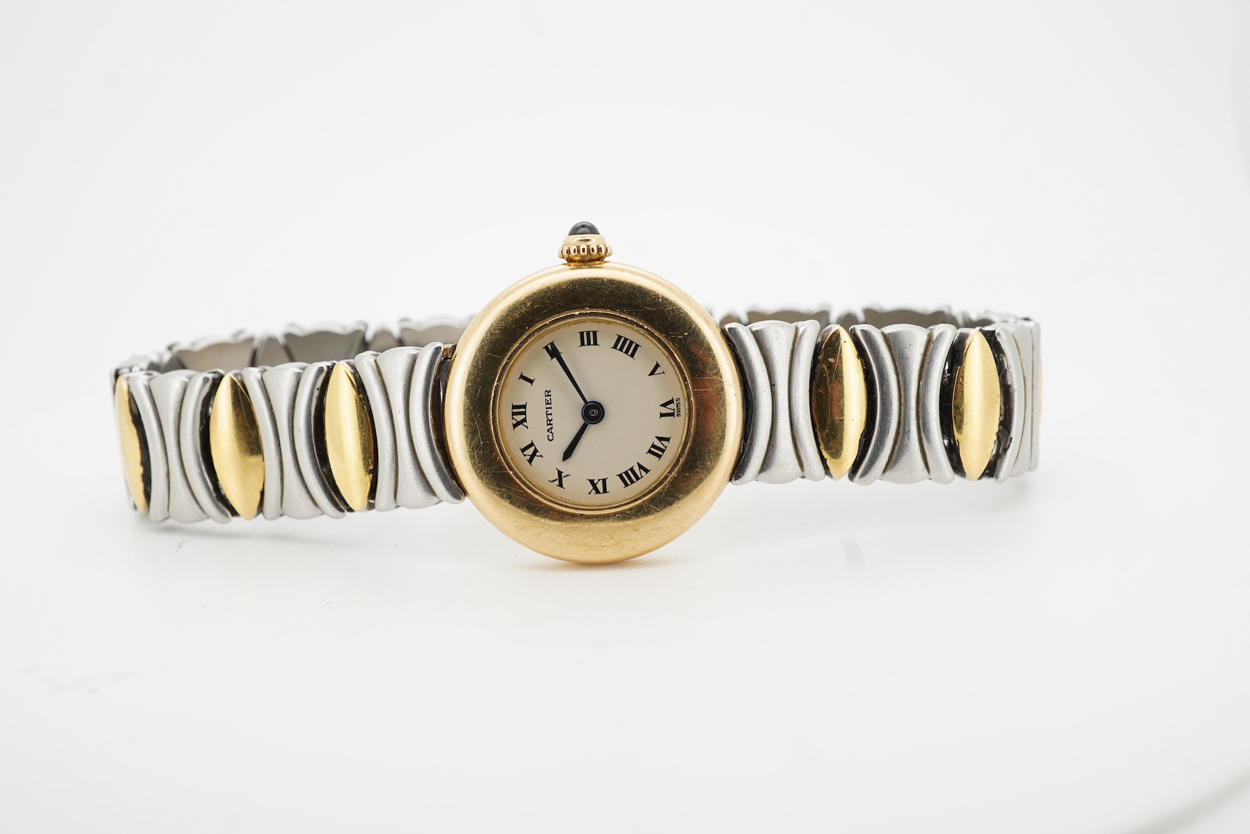 Cartier, a lady's gold and stainless steel wristwatch, 'Colisée', ref.8057908C